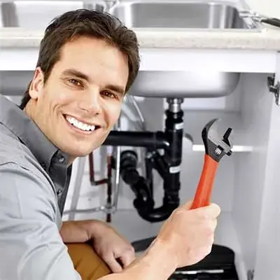 Valley Slab Leak Pro team member holding a wrench